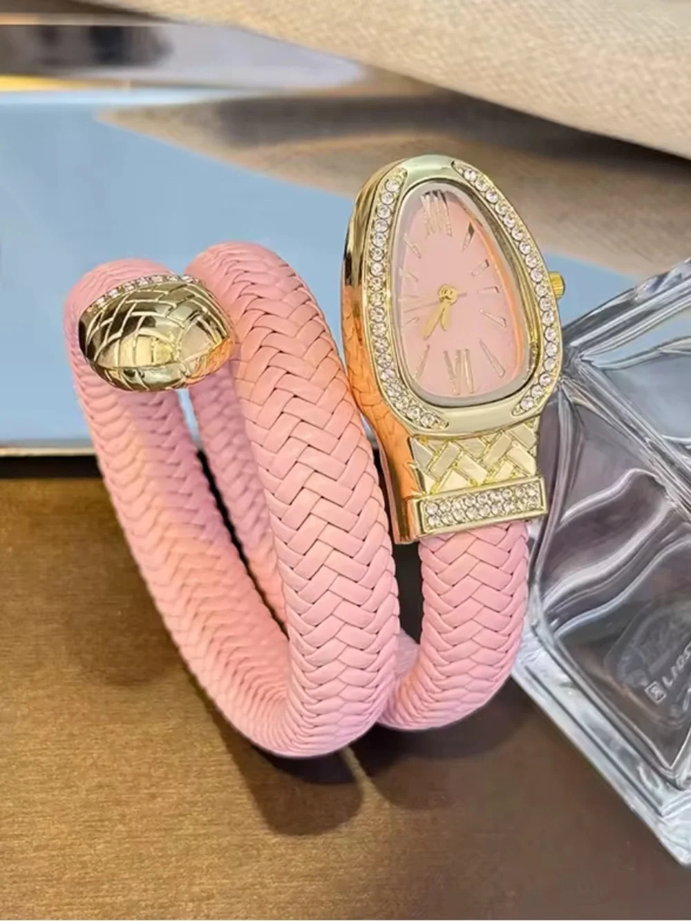 Serpentine Elegant Pink Braided Wrap Watch with Gold Crystal Accents